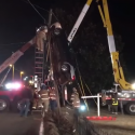 Woman DRIVES UP Power Line!